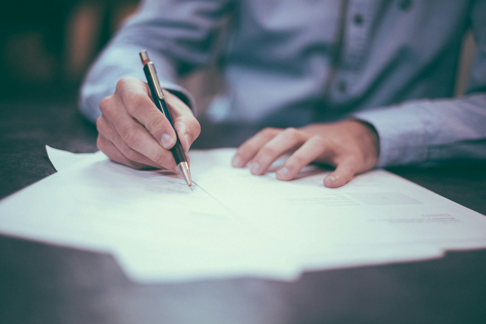 Procurement specialist reviewing commercial contracts